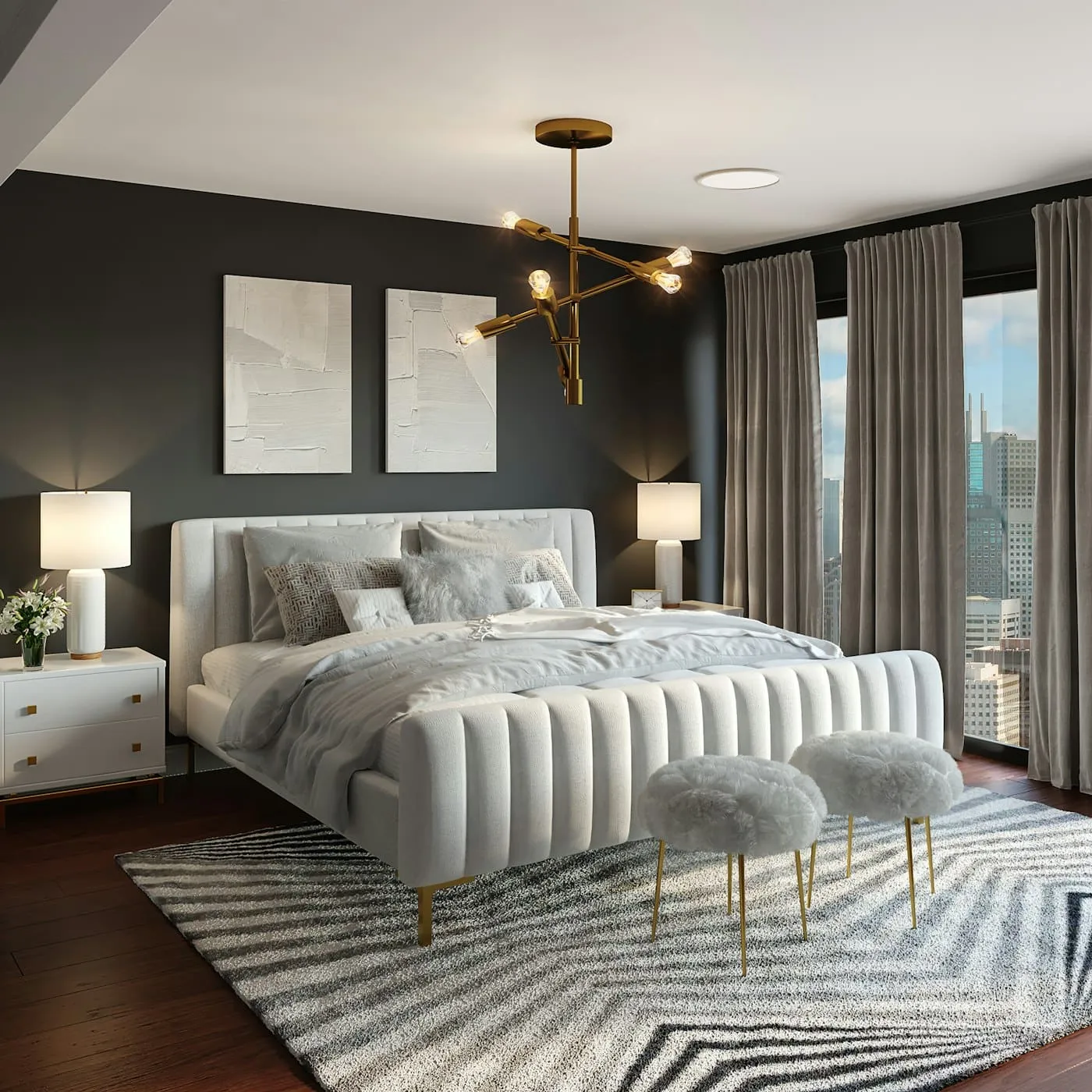 Sheer white linen curtains pooling on a light timber floor in a bright coastal bedroom
